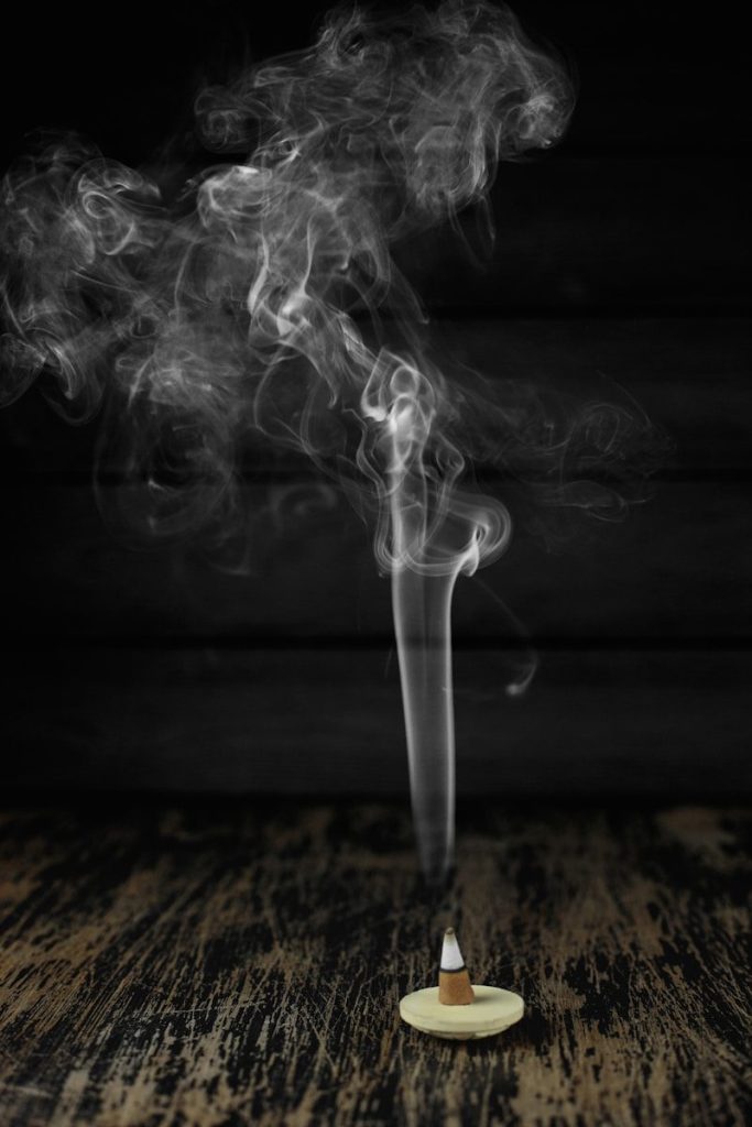 white smoke on black surface